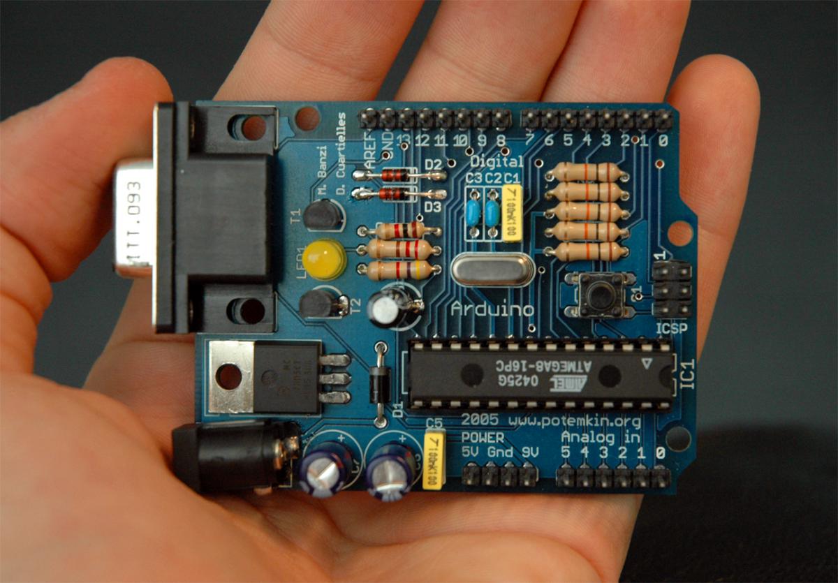 an Arduino/Genuino microcontroller board fits in the palm of one hand